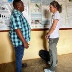 Rachel talking with KMFRI Representative